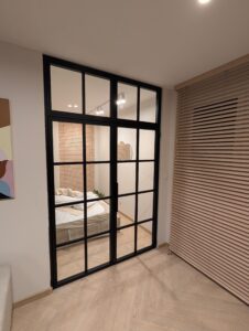 Nowoczesne drzwi loftowe dwuskrzydłowe – czarne przeszklone drzwi stalowe do sypialni Loft Steel Tarnów